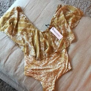 Yellow bodysuit
